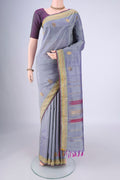 Blue Grey Kanjivaram Silk Saree with Plain Body and Zari Border.  displayed on a mannequin