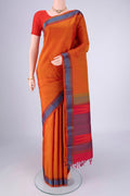 Mustard Kanchipuram Silk Saree with Plain Body and Thread Border.  displayed on a mannequin