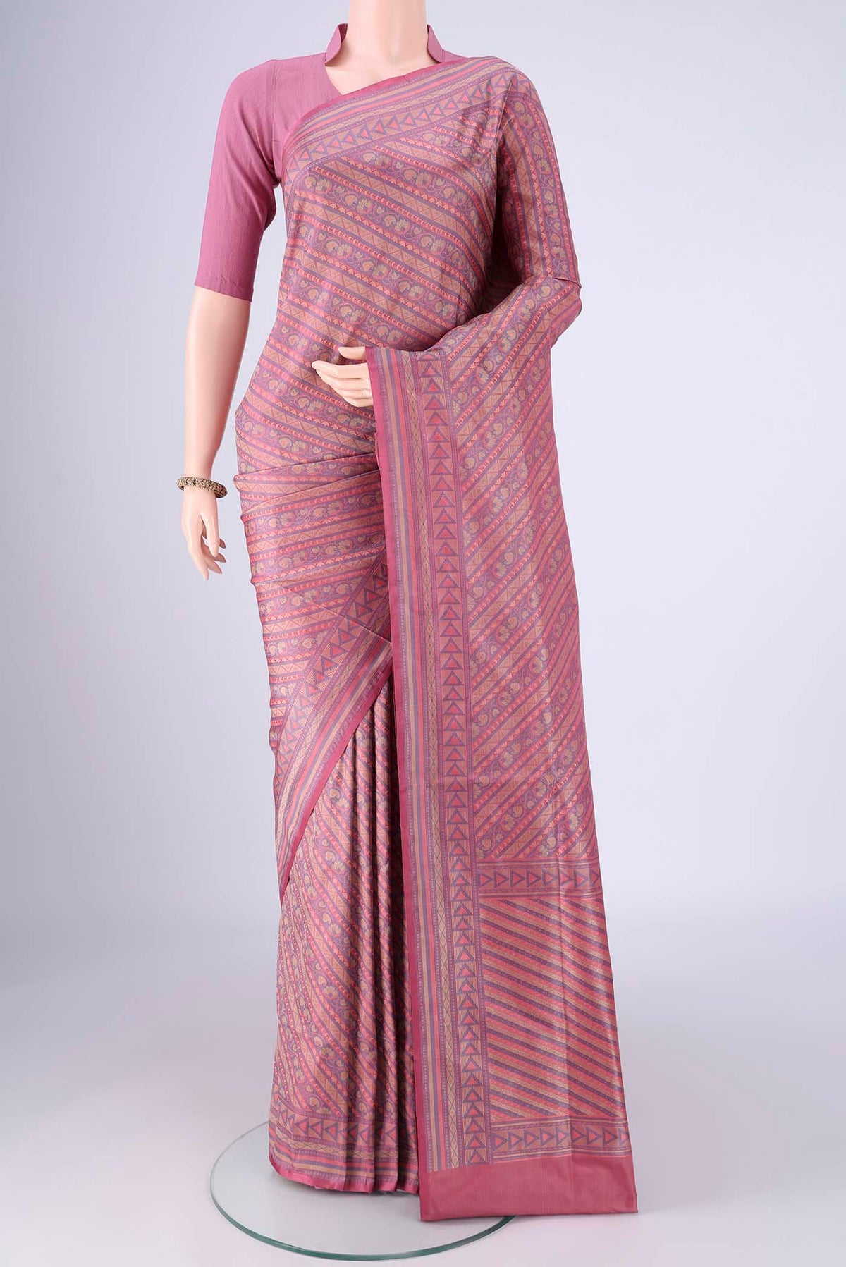 Rose pink Banarasi Tanchoi Silk Saree with Jacquard design on the body and Zari Border.  displayed on a mannequin