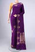 Violet Banarasi Katan Silk Saree with Zari Butta on the body and Zari Border.  displayed on a mannequin