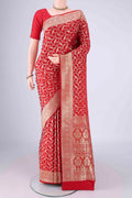 Red Banarasi Silk Saree with Zari Brocade on the body and Zari Border.  displayed on a mannequin