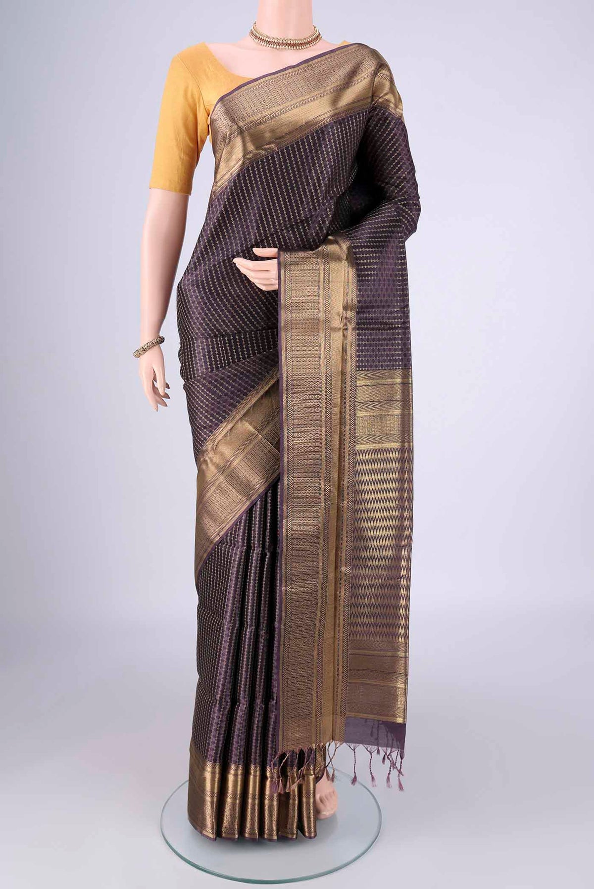 Purple Soft Silk Saree with Jacquard With Zari Butta on the body and Zari Border.  displayed on a mannequin