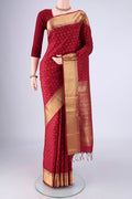 Maroon Soft Silk Saree with Jacquard With Zari Butta on the body and Zari Border.  displayed on a mannequin