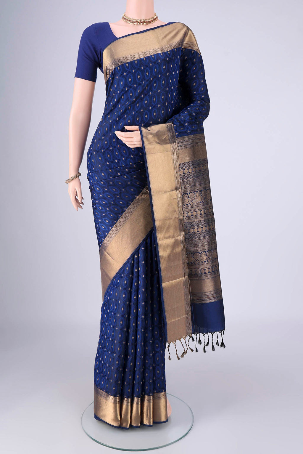 Dark Blue Soft Silk Saree with Jacquard With Zari Butta on the body and Zari Border.  displayed on a mannequin