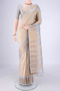 Beige Gadwal Silk Saree with Zari Butta on the body and Zari Border.  displayed on a mannequin