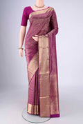Purple Soft Silk Saree with Zari Brocade on the body and Zari Border.  displayed on a mannequin