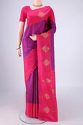 Purple Kanchipuram Silk Saree with Zari Butta on the body and Zari Border.  displayed on a mannequin
