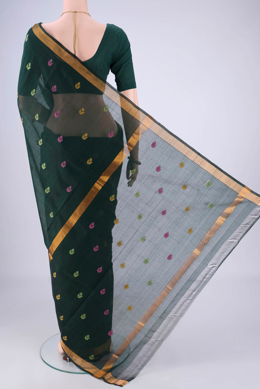 Flat view of Bottle Green Uppada Cotton Saree with Thread Butta on the body and Zari Border. 