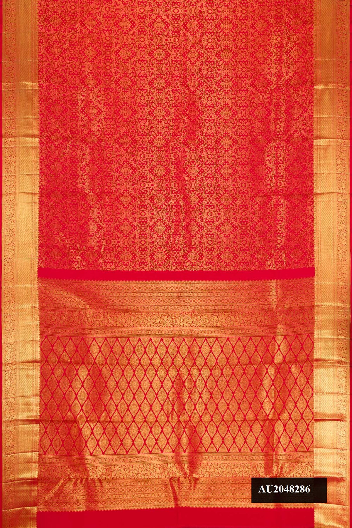 Red Dual Tone Kanchipuram Silk Saree with Zari Brocade on the body and Zari Border.  displayed on a mannequin