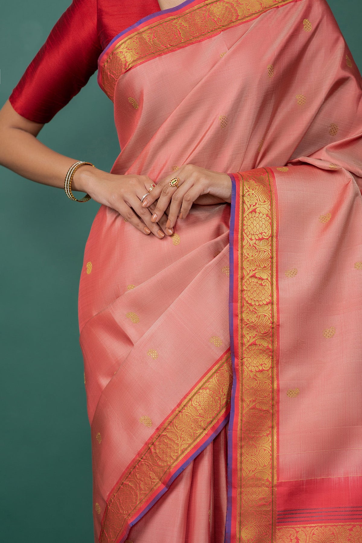 Close up image of the blouse of Mauve Kanchipuram Silk Saree with Zari Butta on the body and Zari Border