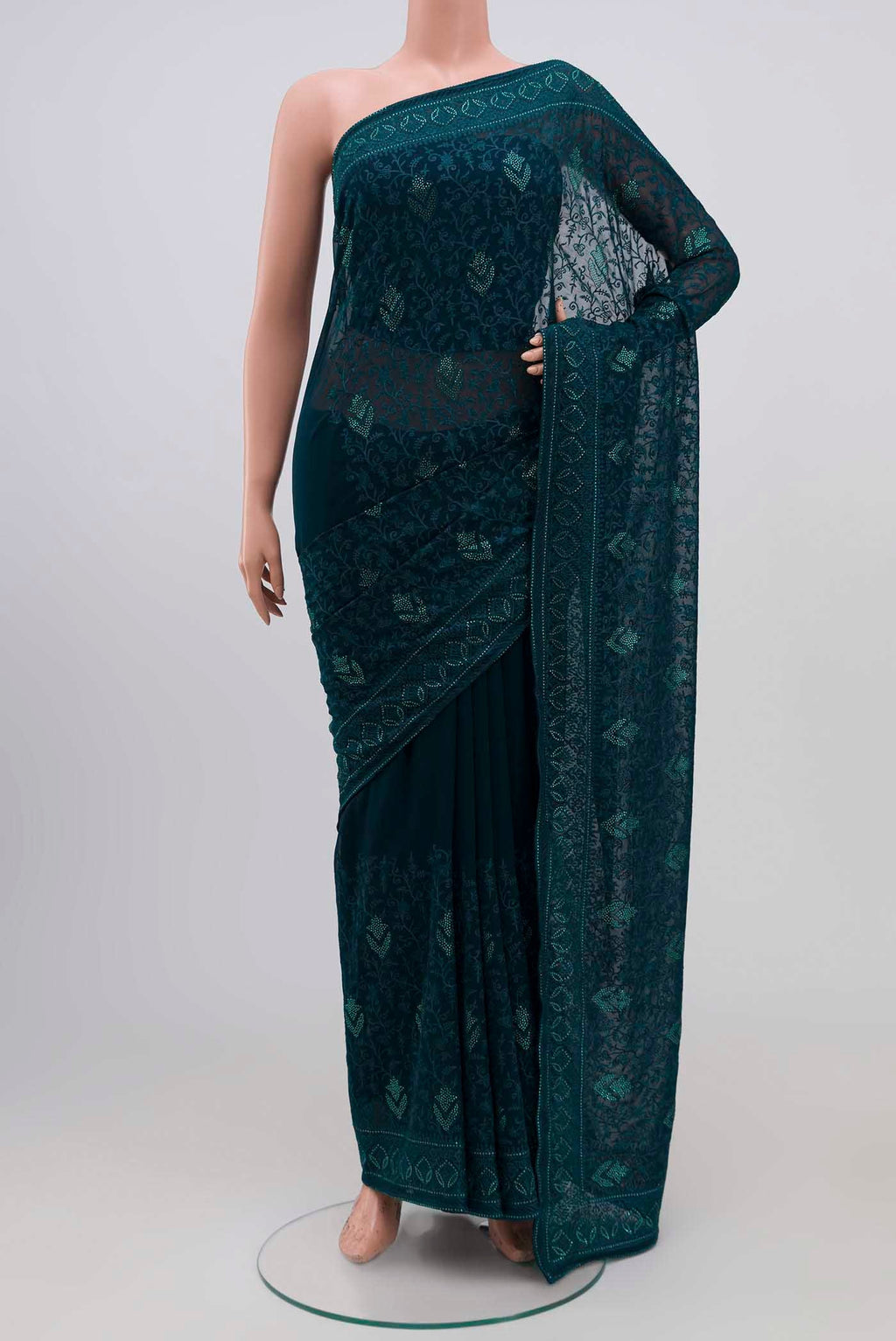 Blue Blended Georgette Saree with Embroidery on the body and Embroidery Border.  displayed on a mannequin