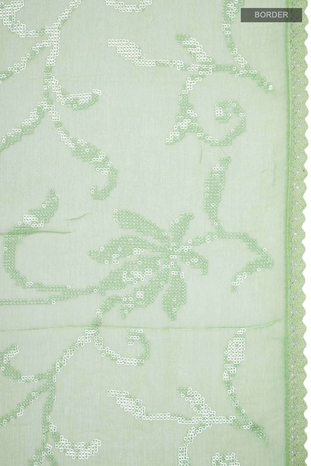 Border image of Green Blended Chiffon Saree with Embroidery on the body and Lace Border. 
