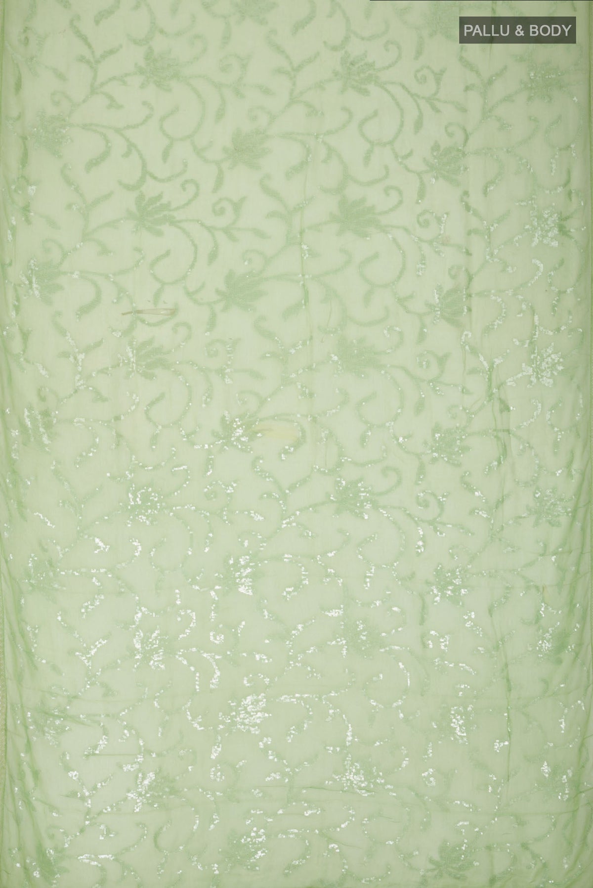Flat view of Green Blended Chiffon Saree with Embroidery on the body and Lace Border. 