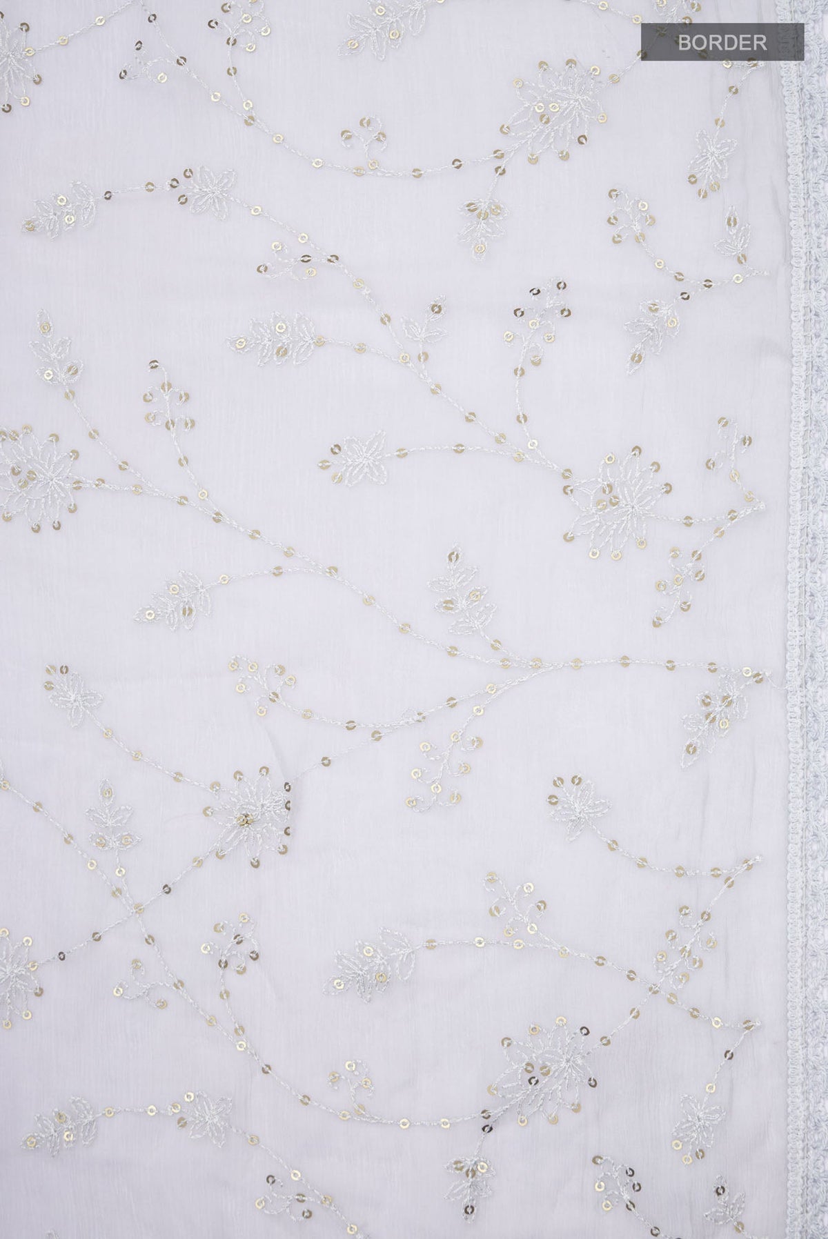 Border image of Grey Blended Chiffon Saree with Embroidery on the body and Lace Border. 