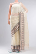 Cream Blended Kora Cotton Saree with Embroidery on the body and Zari And Thread Border.  displayed on a mannequin