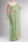 Green Mysore Chiffon Saree with Plain Body and Zari Border.  displayed on a mannequin