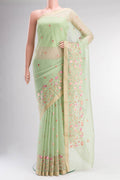 Green Blended Kota Cotton Saree with Embroidery on the body and Zari Border.  displayed on a mannequin