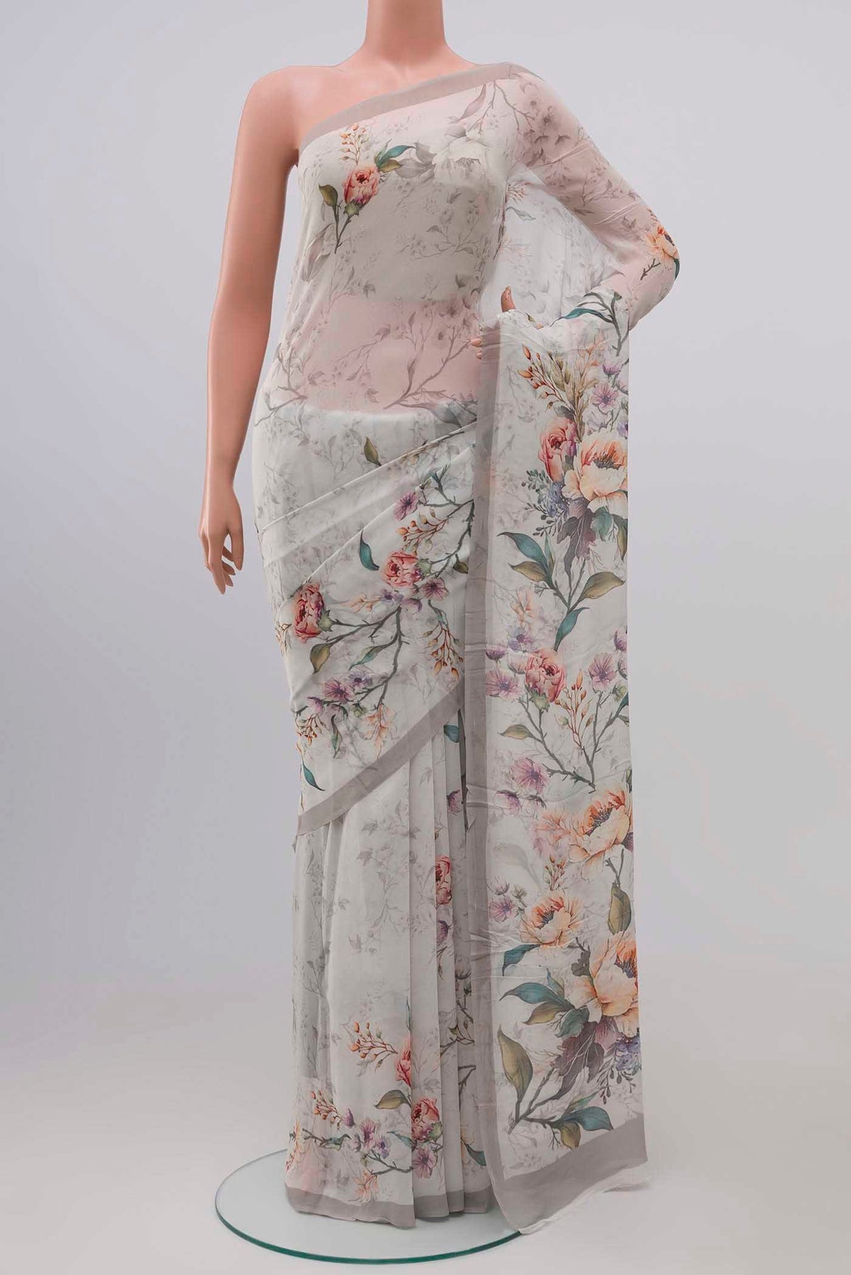 Off White Blended Georgette Saree with Stripes on the body and Plain Border.  displayed on a mannequin
