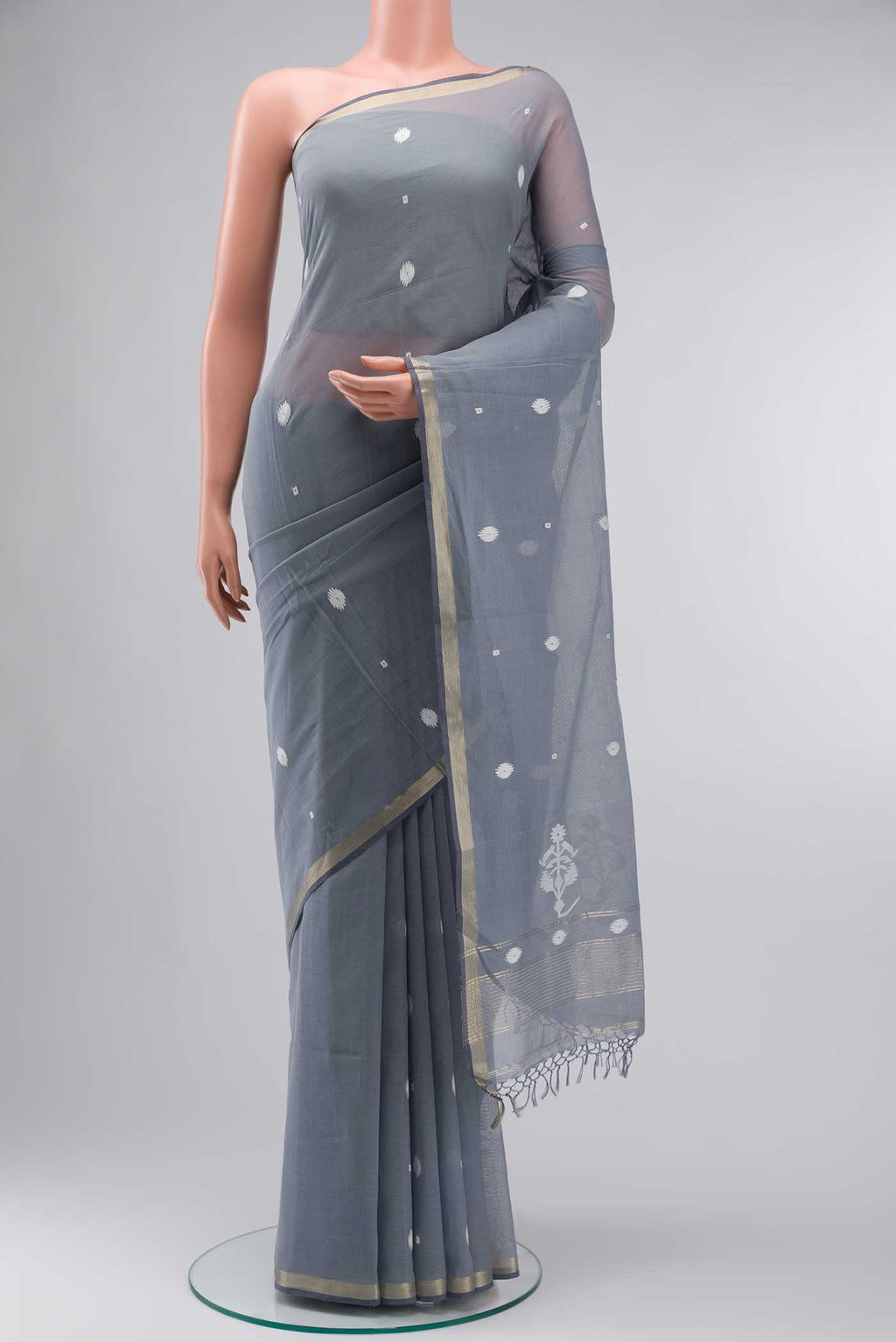 Grey Bengal Cotton Saree with Jamdani on the body and Zari Border displayed on a mannequin