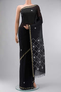 Black Bengal Cotton Saree with Plain Body and Zari Border displayed on a mannequin