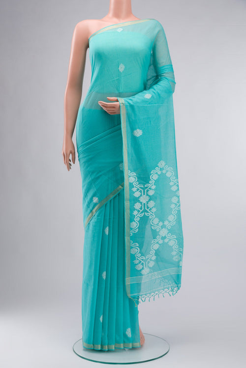 Turquoise Bengal Cotton Saree with Jamdani on the body and Zari Border displayed on a mannequin
