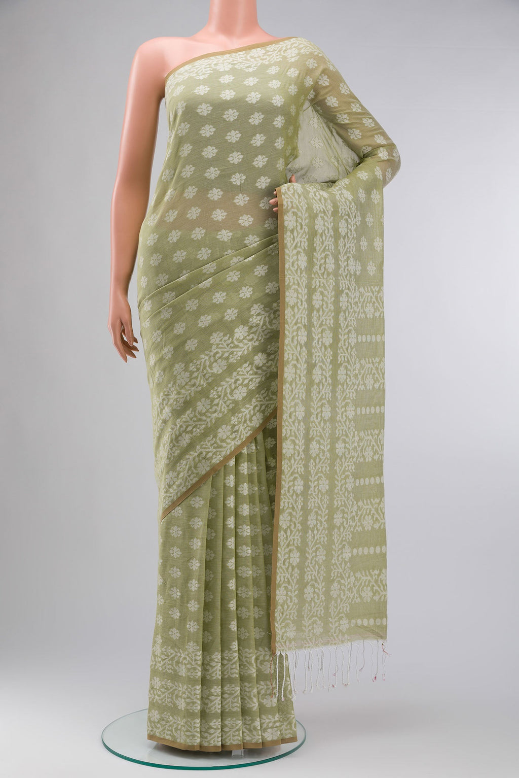 Light Green Bengal Cotton Saree with Jamdani on the body and Thread Border displayed on a mannequin