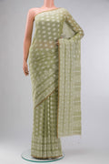 Light Green Bengal Cotton Saree with Jamdani on the body and Thread Border displayed on a mannequin