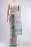 Grey Bengal Cotton Saree with Jamdani on the body and Plain Border displayed on a mannequin