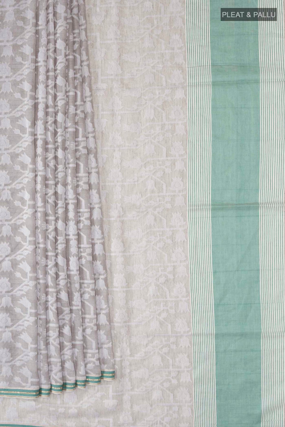 Pleats and pallu of Grey Bengal Cotton Saree with Jamdani on the body and Plain Border