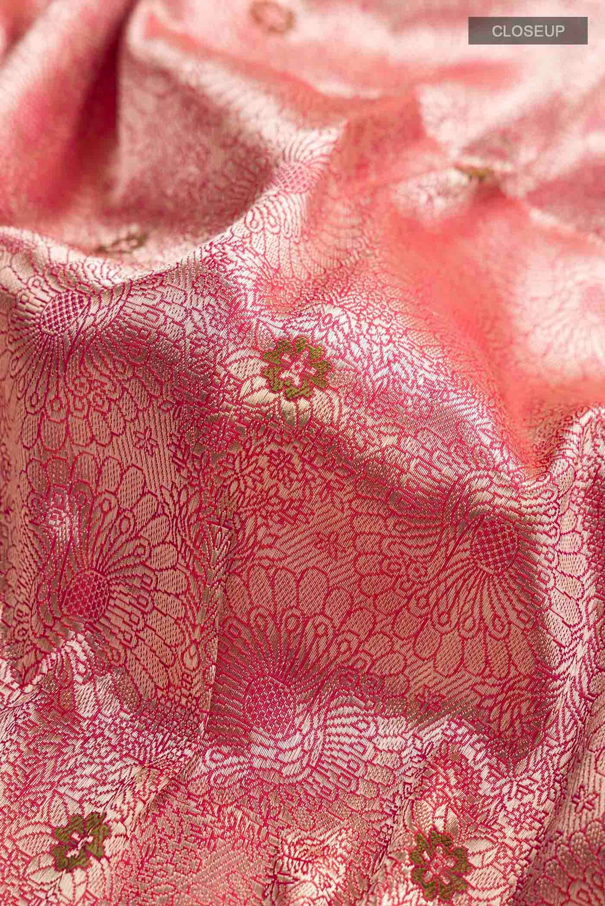 Close up of Multi Color Banarasi Silk Saree with Zari Brocade on the body and Zari Border displaying folds