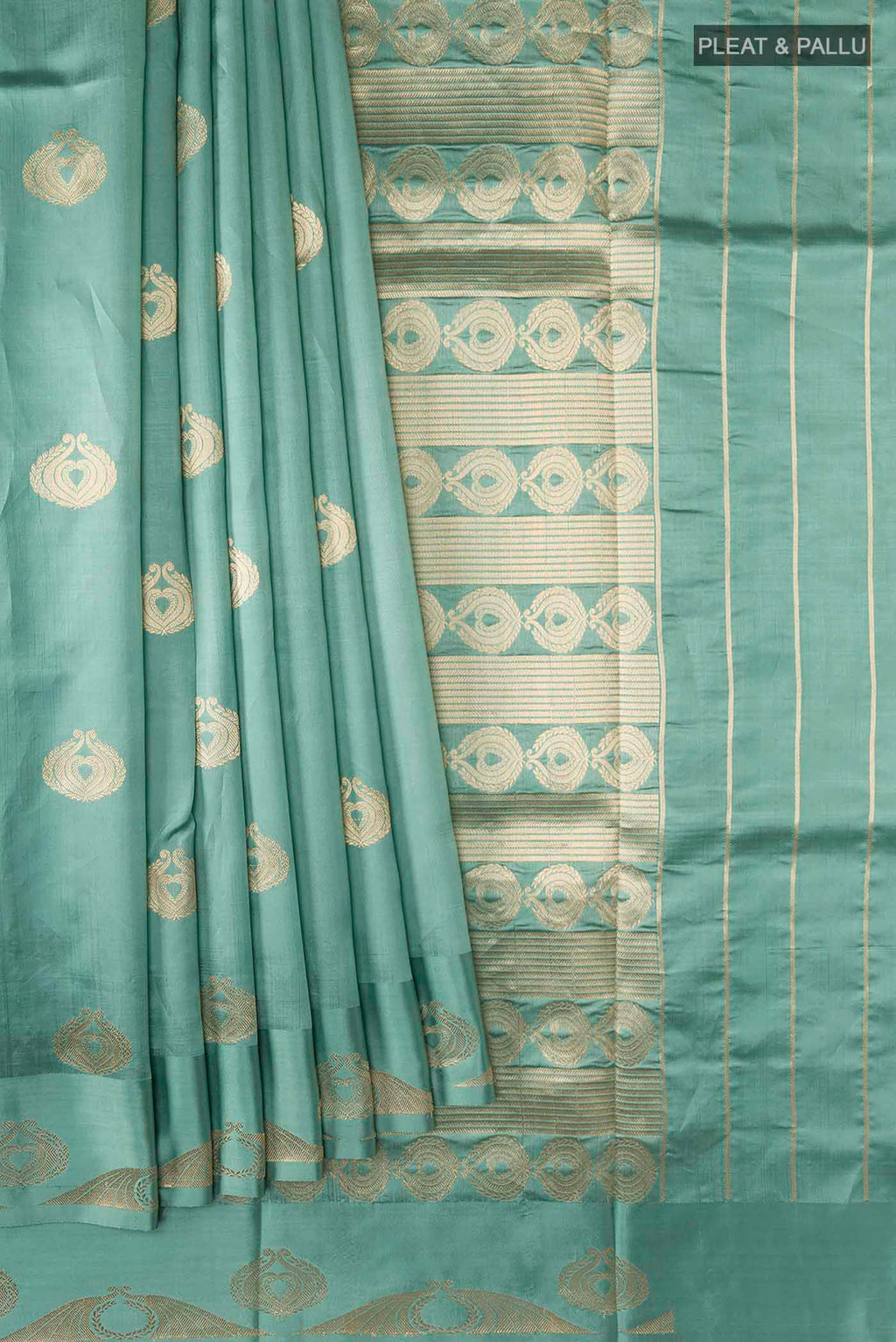Pleats and pallu of Green Banarasi Katan Silk Saree with Zari Butta on the body and Zari Border