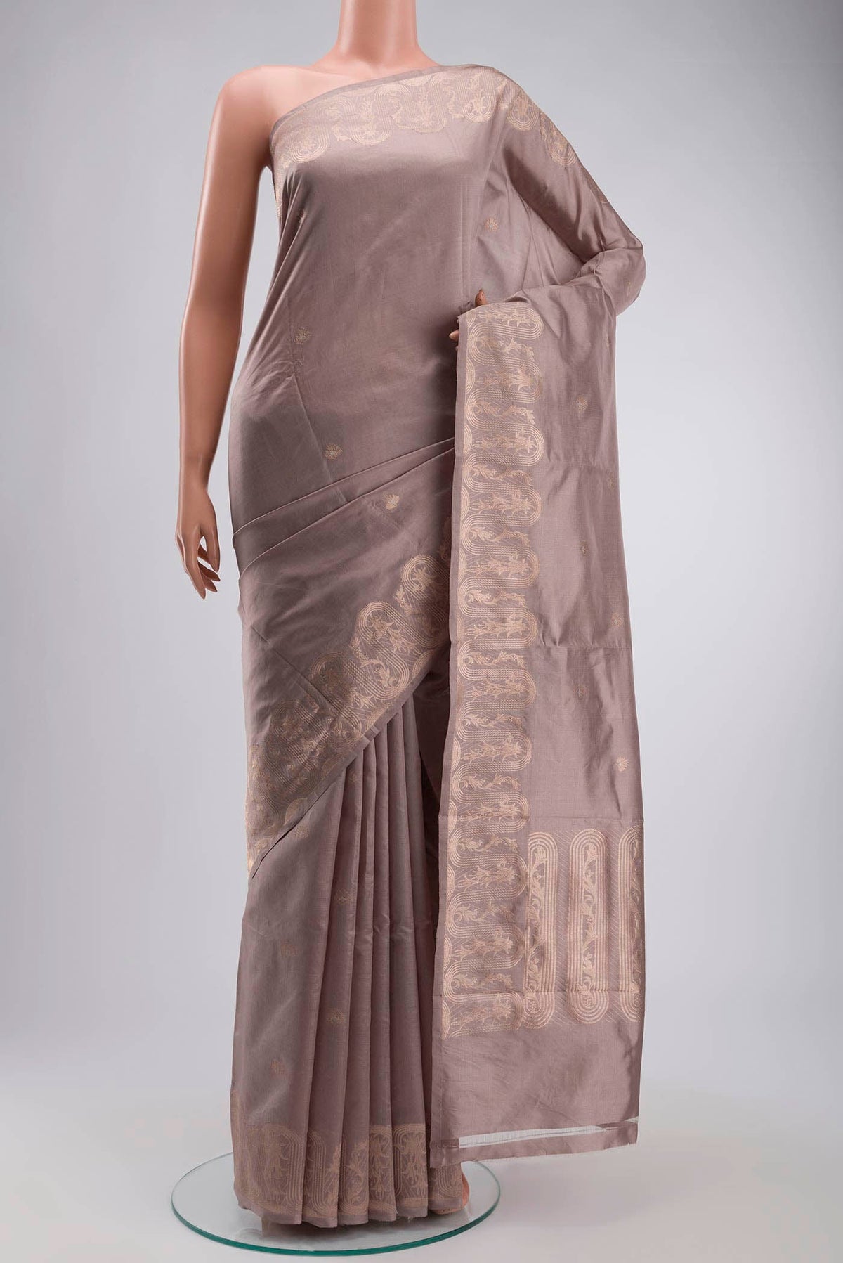 Mauve Banarasi Katan Silk Saree with Zari Butta on the body and Zari Border displayed on a mannequin