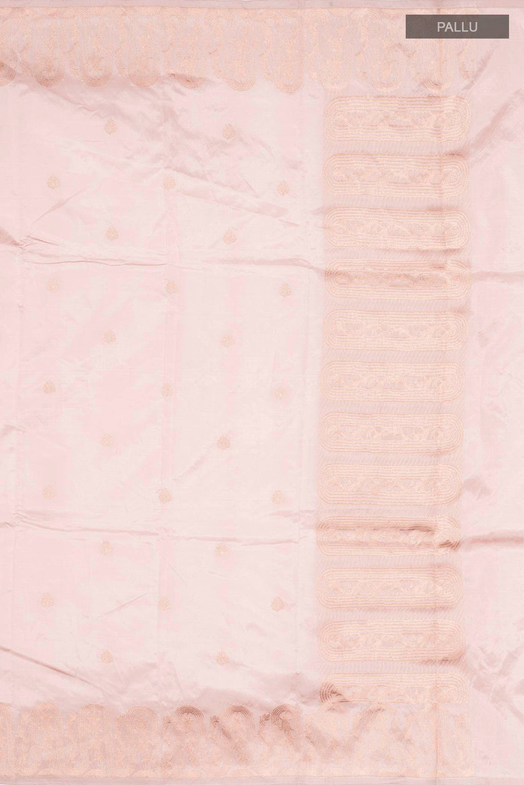 Close up image of the pallu of Rose Gold Banarasi Katan Silk Saree with Zari Butta on the body and Zari Border