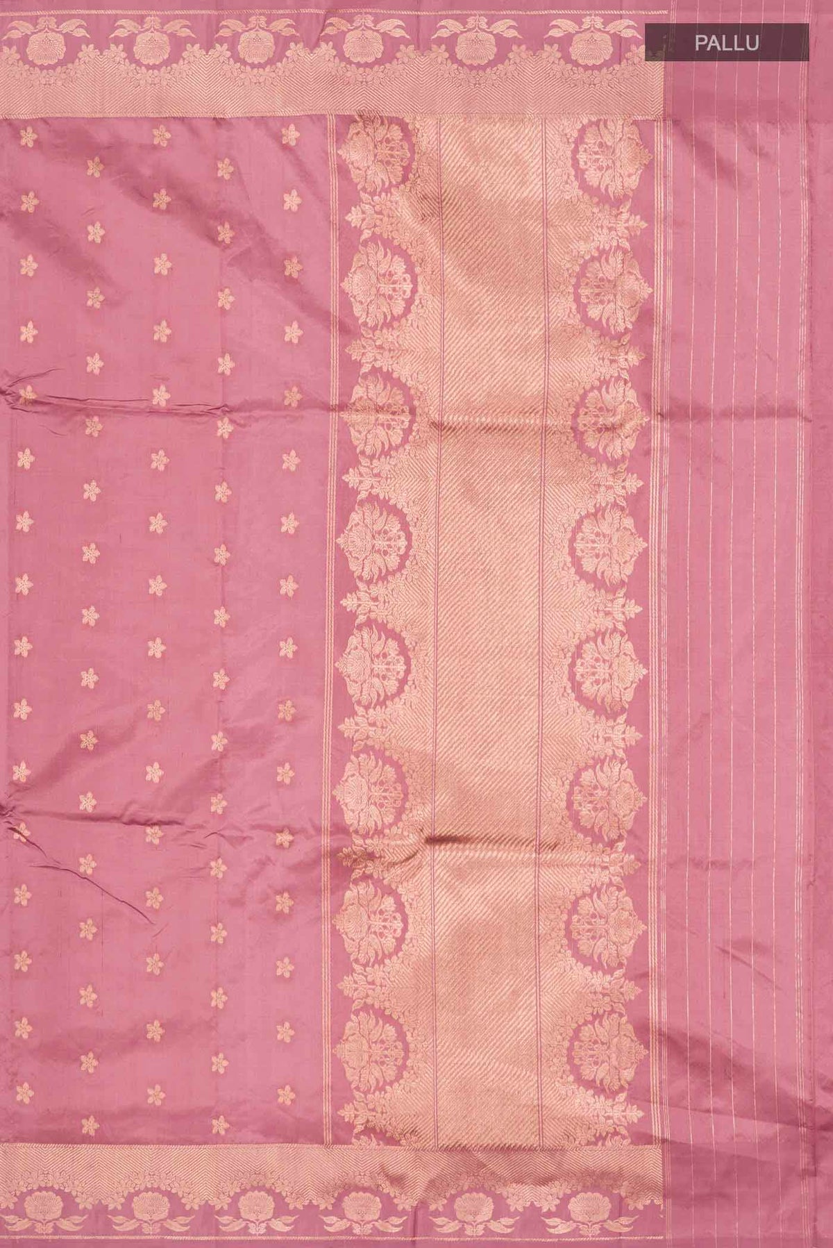 Close up image of the pallu of Coral Banarasi Katan Silk Saree with Zari Butta on the body and Zari Border