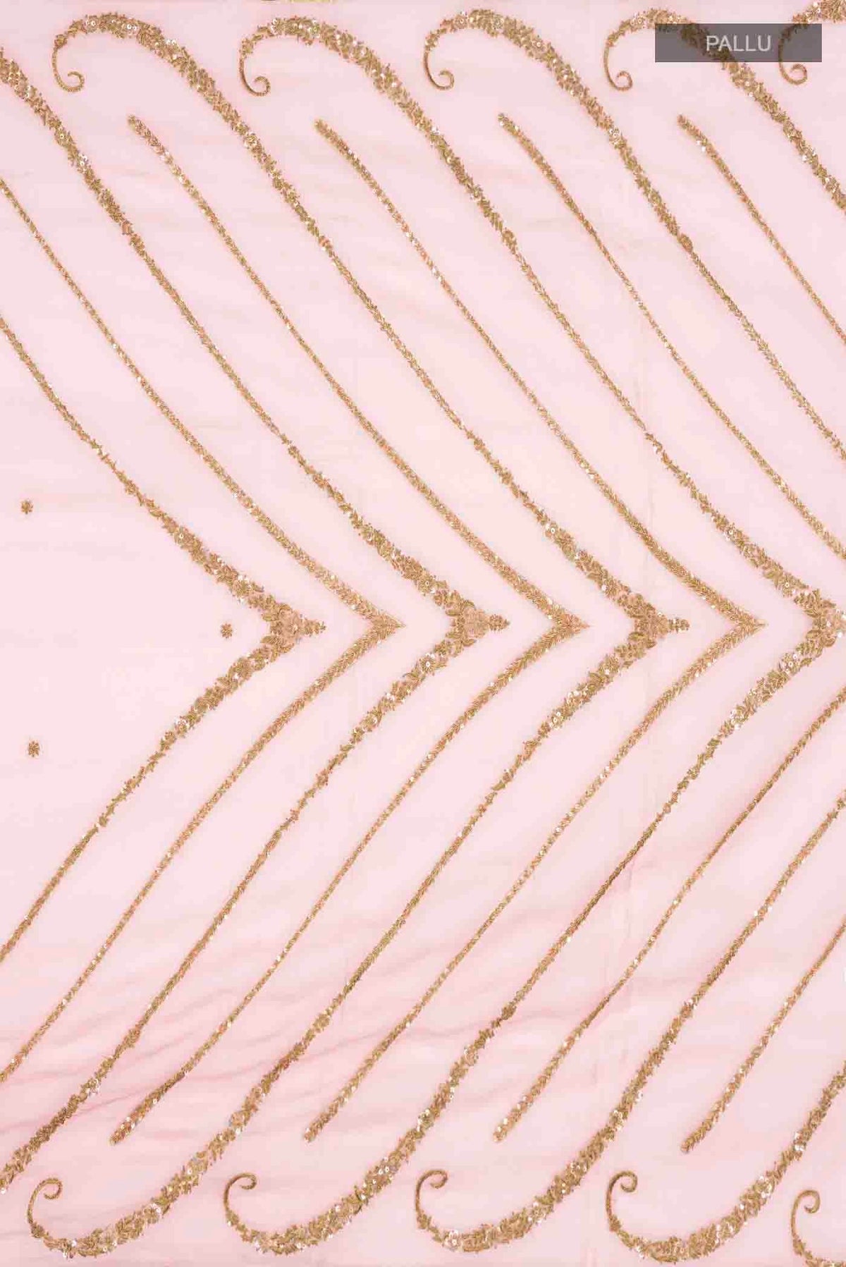 Close up image of the pallu of Pink Organza Silk Saree with Embroidery on the body and Zari Border