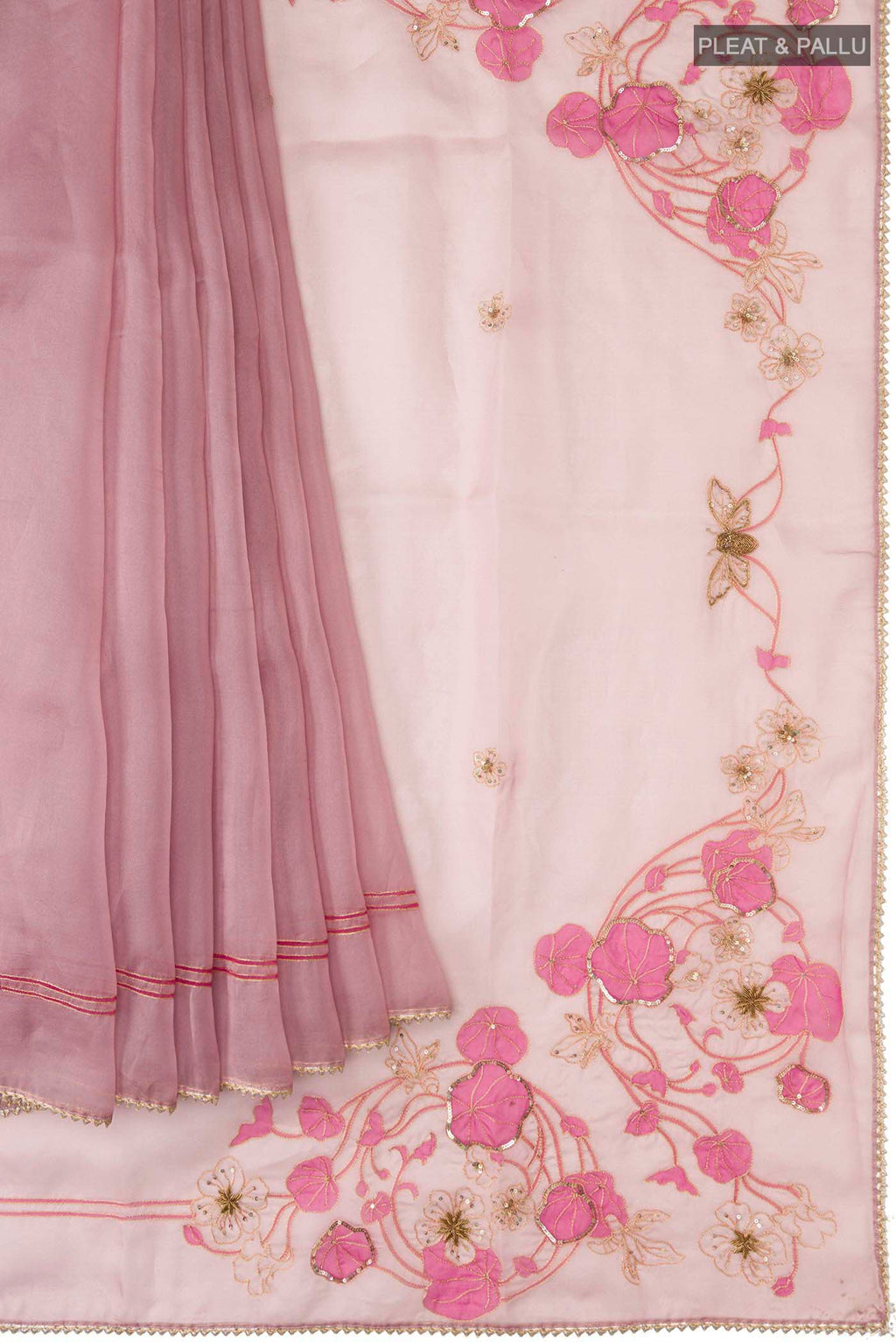 Pleats and pallu of Mauve Organza Silk Saree with Plain Body and Embroidery Border