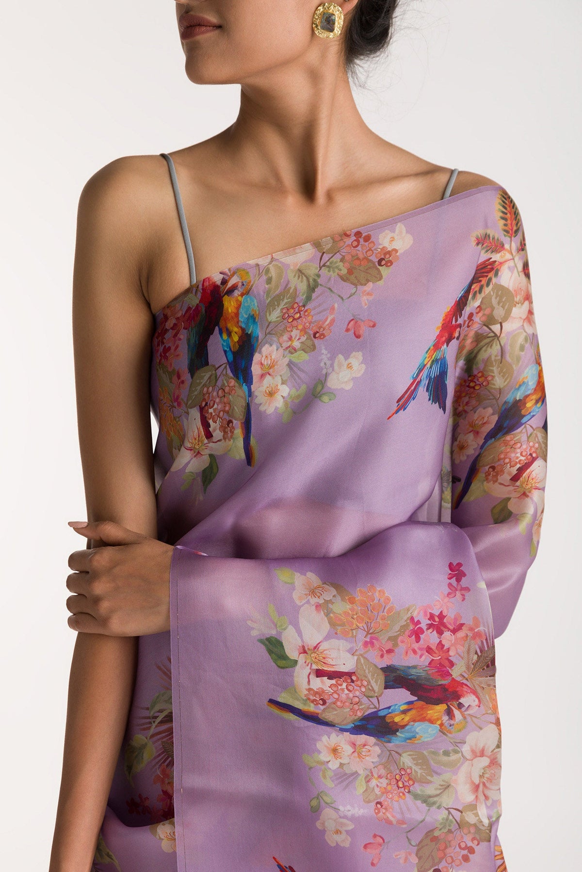 Close up of Lilac Satin Organza Saree with Bird Print on the body and Without Border displaying folds