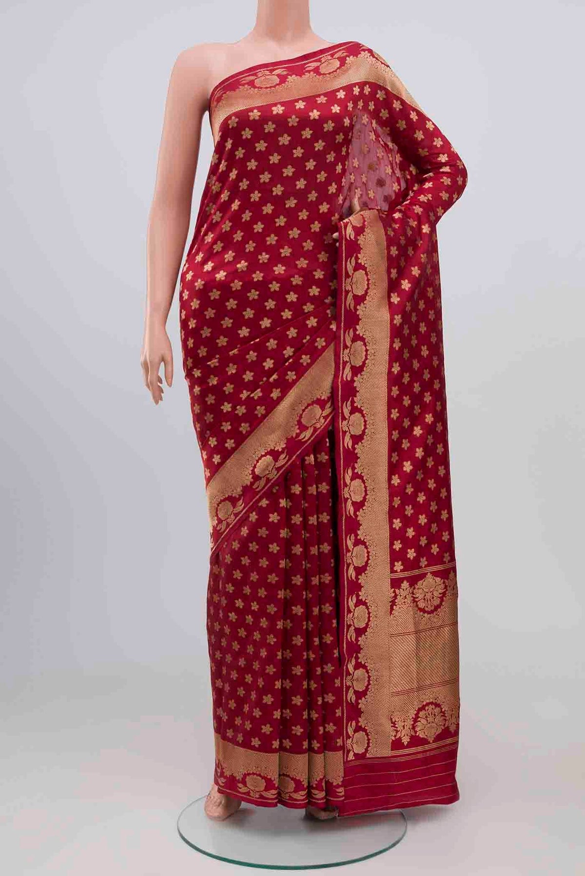 Maroon Banarasi Katan Silk Saree with Zari Butta on the body and Zari Border displayed on a mannequin