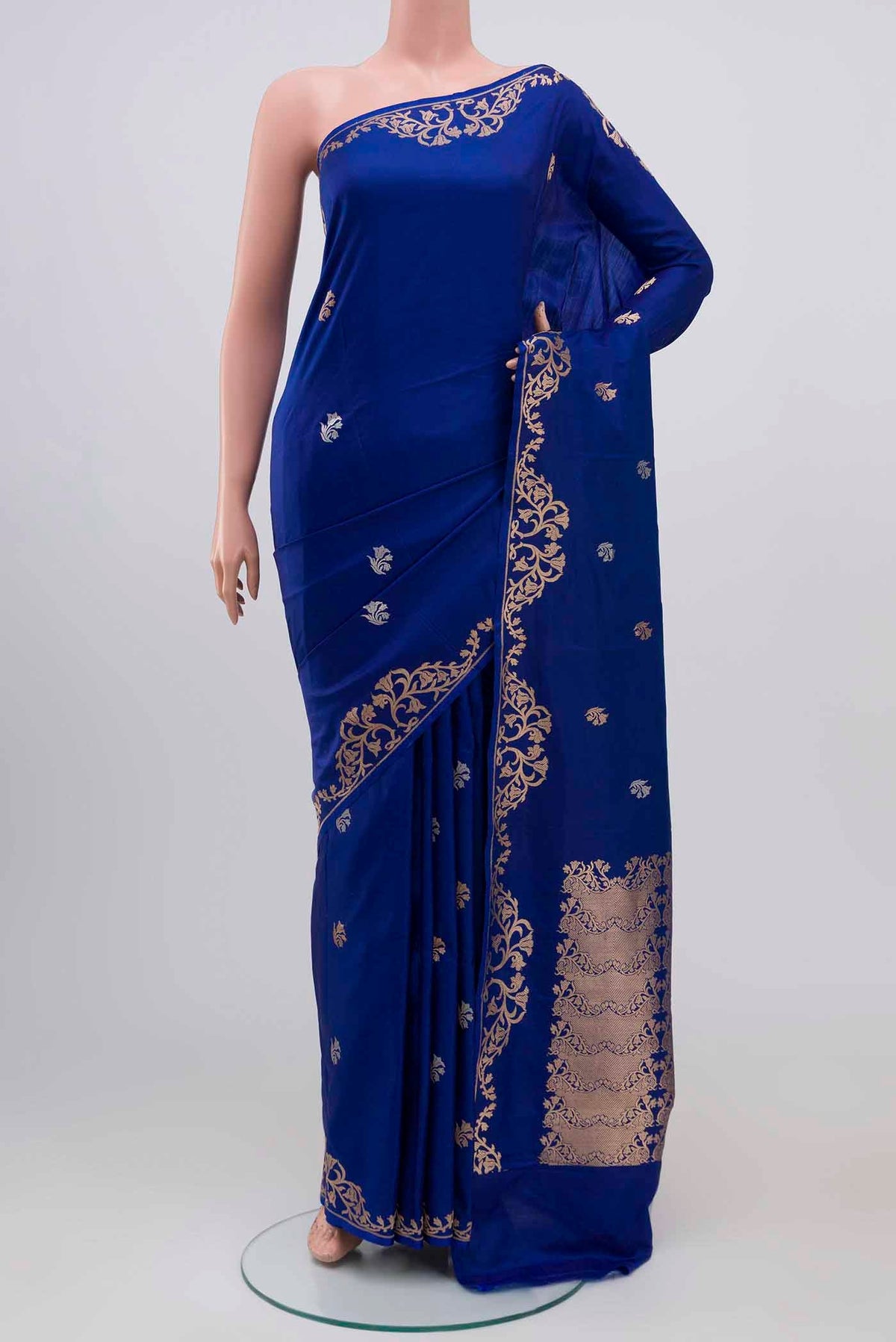Blue Banarasi Katan Silk Saree with Zari Butta on the body and Zari Border displayed on a mannequin