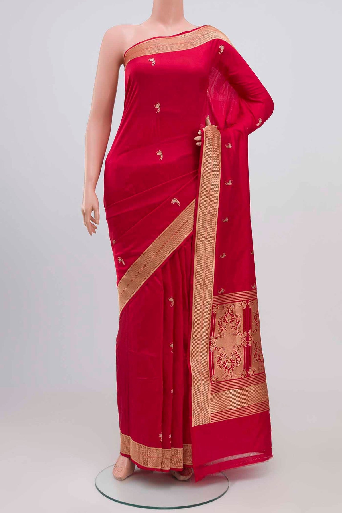 Red Banarasi Katan Silk Saree with Zari Butta on the body and Zari Border displayed on a mannequin