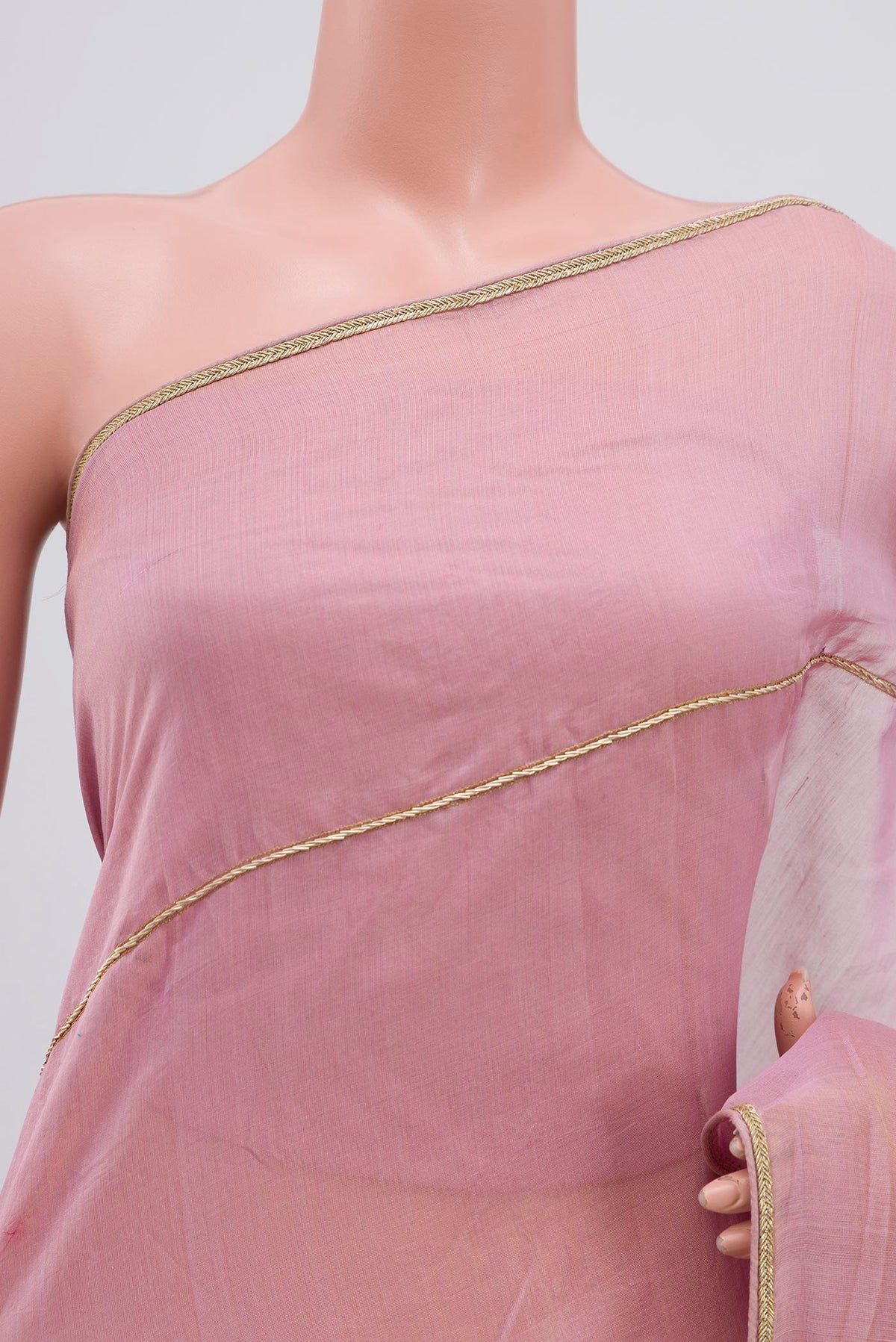 Close up of Pink Silk Cotton Saree with Embroidery on the body and Embroidery Border displaying folds