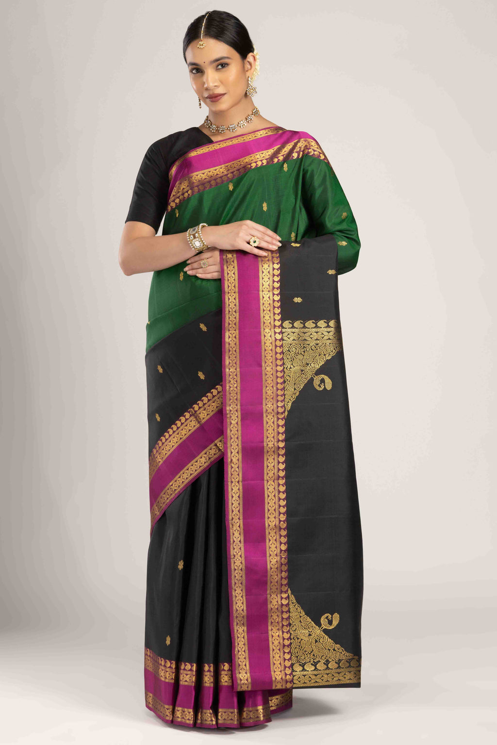 Multi Color Kanchipuram Silk Saree with Half And Half on the body and Zari Border displayed on a mannequin