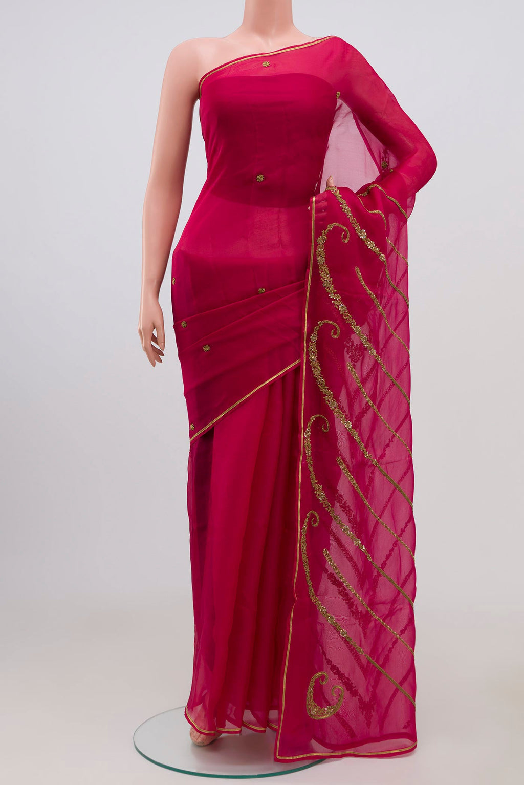 Pink Organza Silk Saree with Embroidery on the body and Embroidery Border displayed on a mannequin