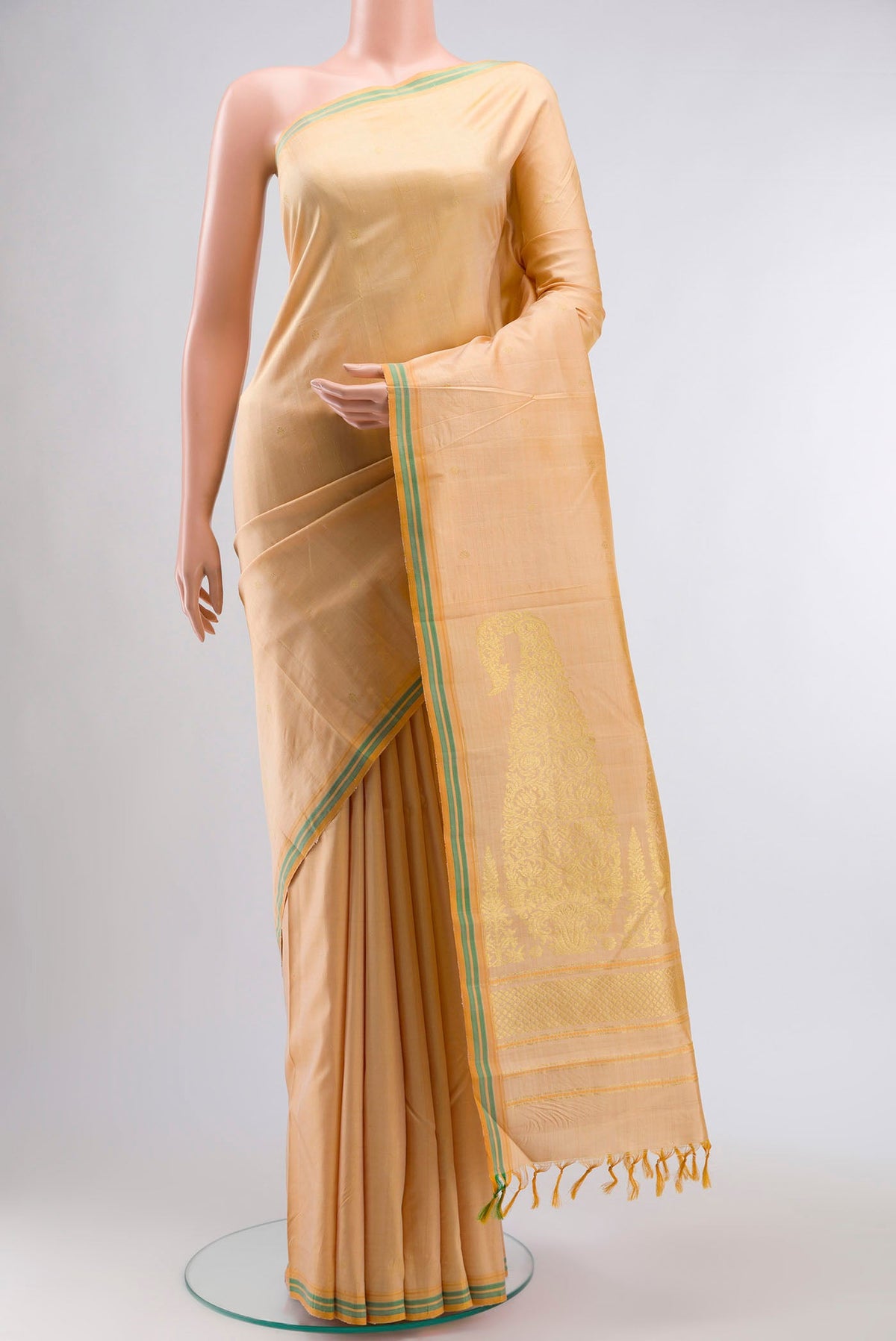 Pure Silk Pure Zari Sandal Kanchipuram Saree with Zari Butta on the body and Plain Border displayed on a mannequin