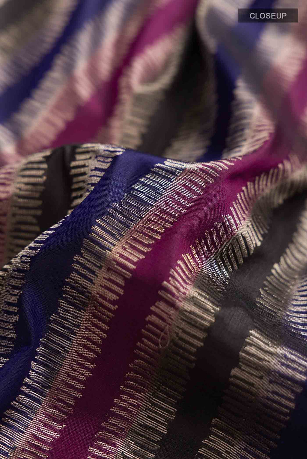 Close up of Multi Banarasi Silk Saree with Stripes on the body and Zari Border displaying folds
