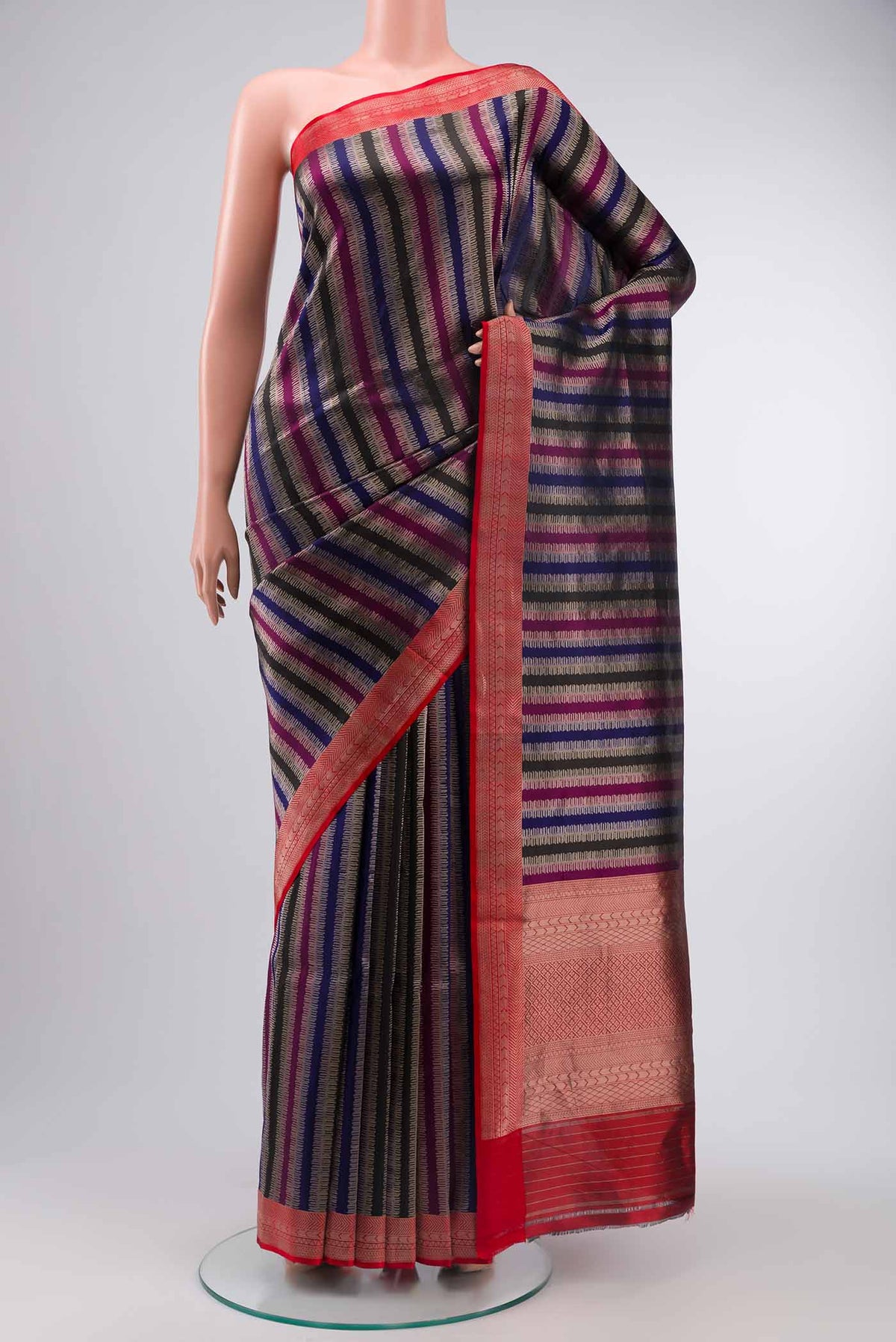 Multi Banarasi Silk Saree with Stripes on the body and Zari Border displayed on a mannequin
