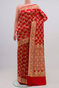 Red Banarasi Saree with Zari Brocade on the body and Zari Border.  displayed on a mannequin