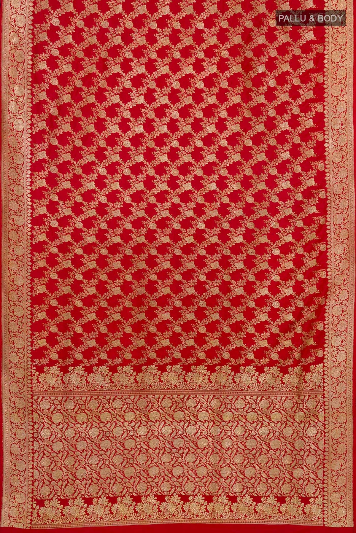 Flat view of Red Banarasi Saree with Zari Brocade on the body and Zari Border. 