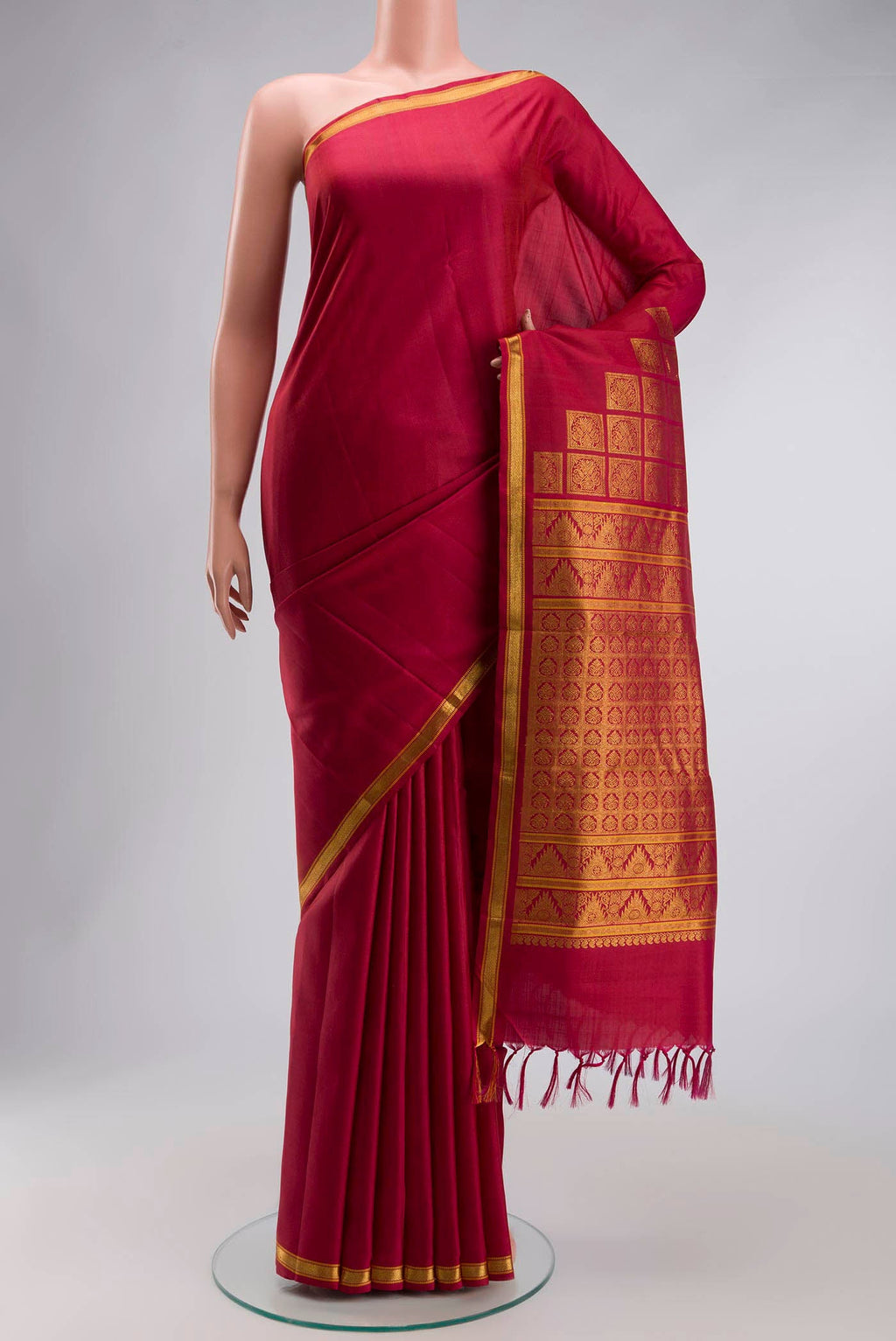 Maroon Kanchipuram Silk Saree with Zari Butta on the body and Zari Border displayed on a mannequin