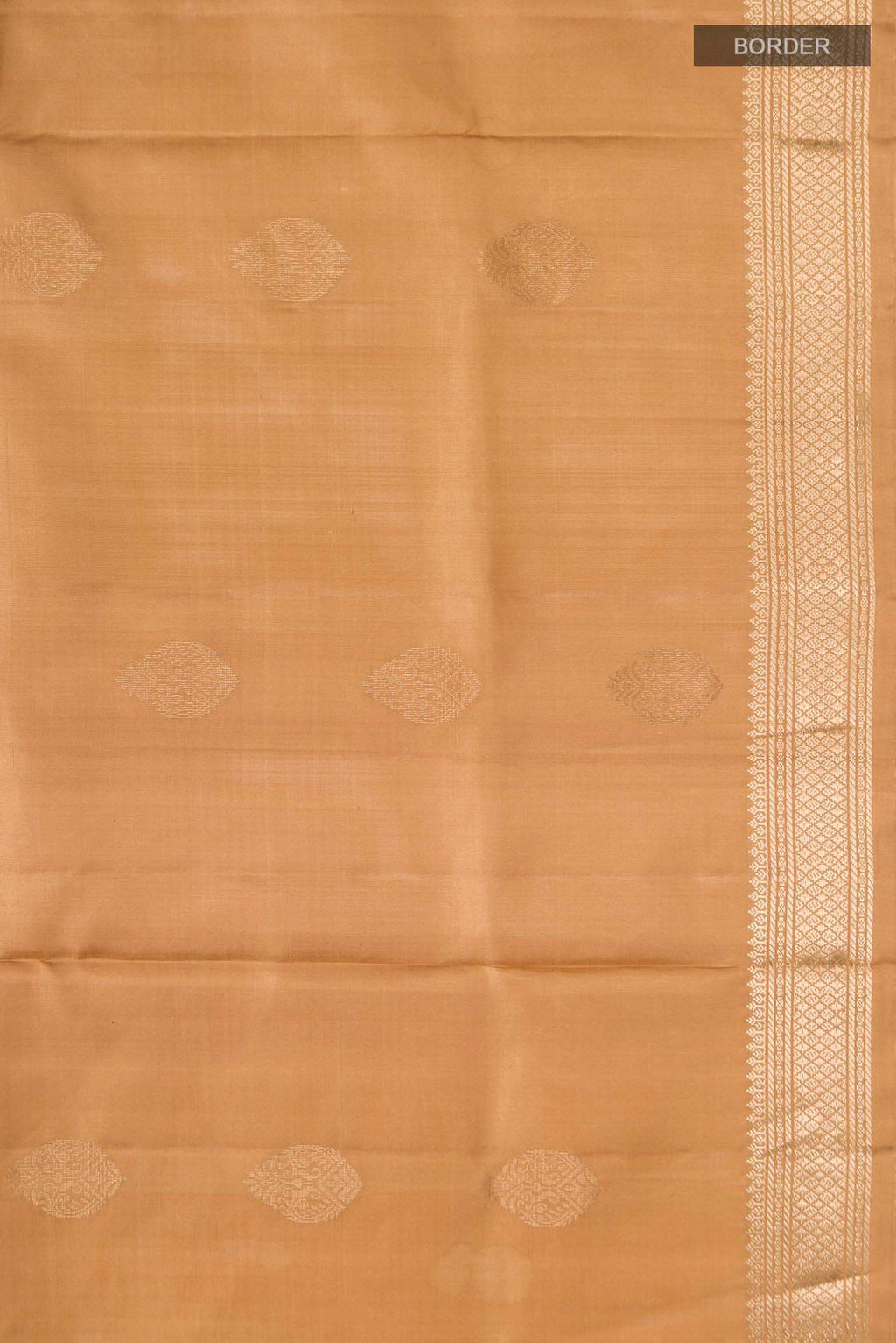 Border image of Brown Soft Silk Saree with Zari Butta on the body and Zari Border